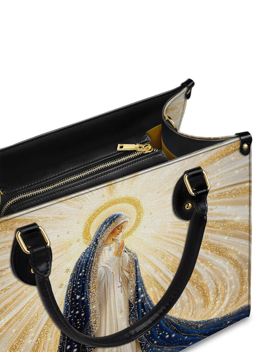 Our Lady’s Eternal Glow Leather Bag