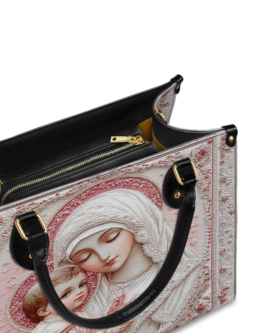 Sacred Serenity: The Madonna’s Tender Embrace Leather Bag