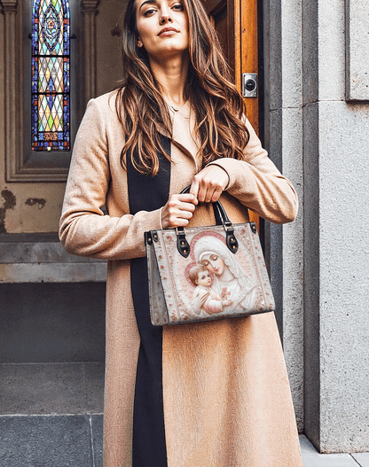  Sacred Serenity: The Madonna’s Tender Embrace Leather Bag