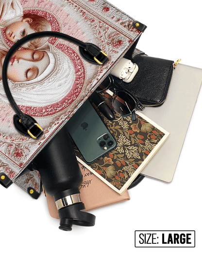  Sacred Serenity: The Madonna’s Tender Embrace Leather Bag